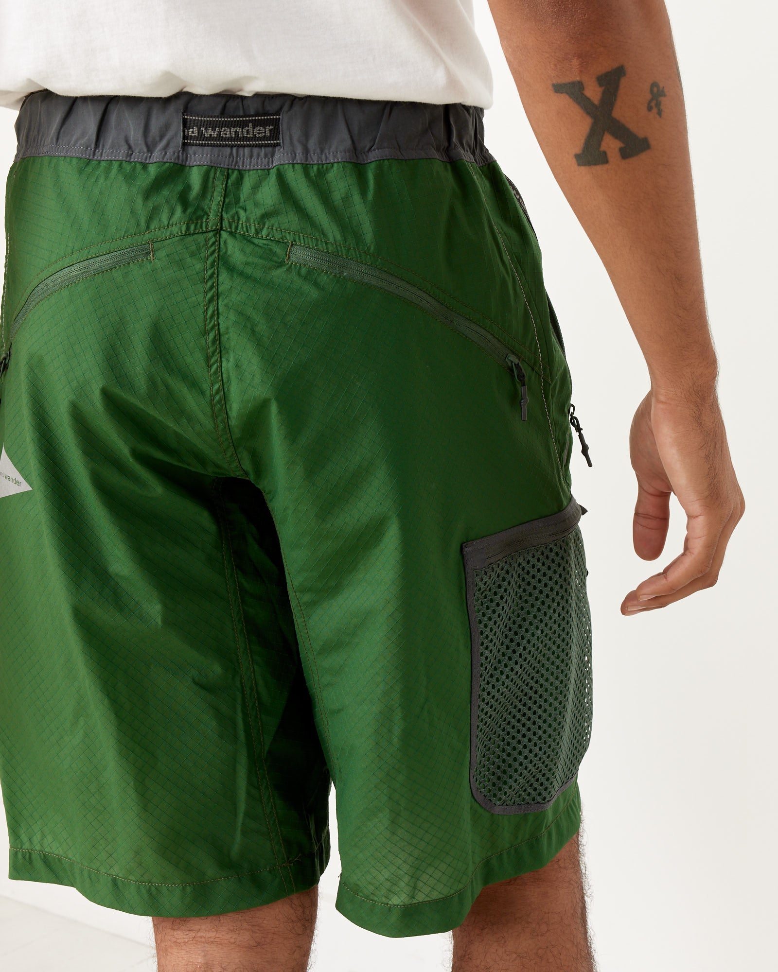 And Wander Breath Rip Short Pants Green
