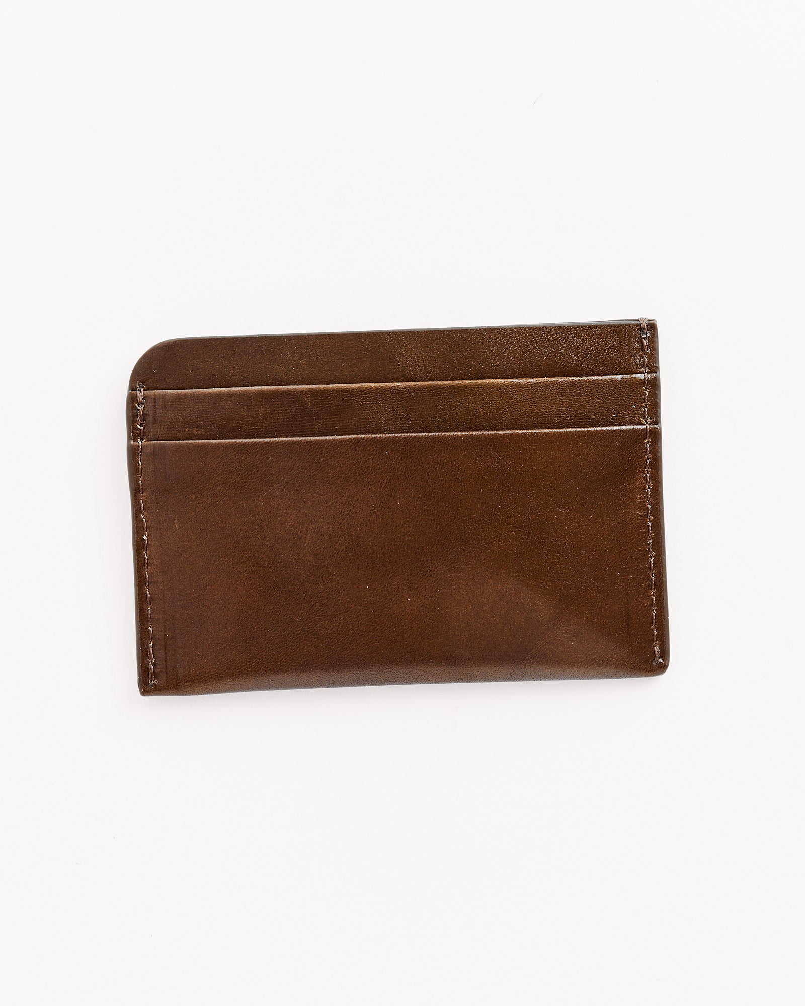 A Dries Van Noten Leather Card Case in olive with two visible card slots, shown on a white background. Crafted in Italy for timeless style and lasting quality.