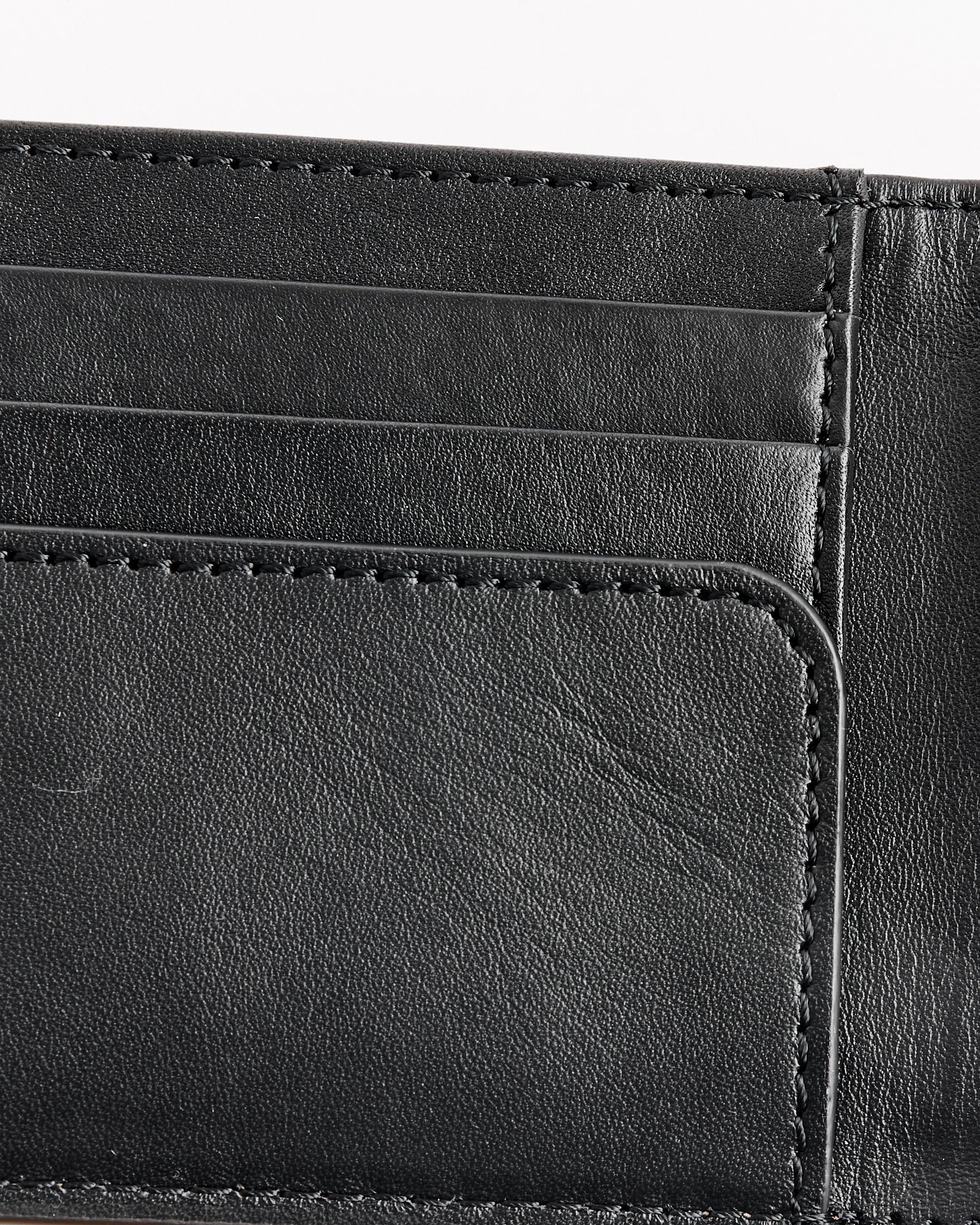 Close-up of the Dries Van Noten 995-151 Wallet in Olive, highlighting leather card slots and intricate stitching.