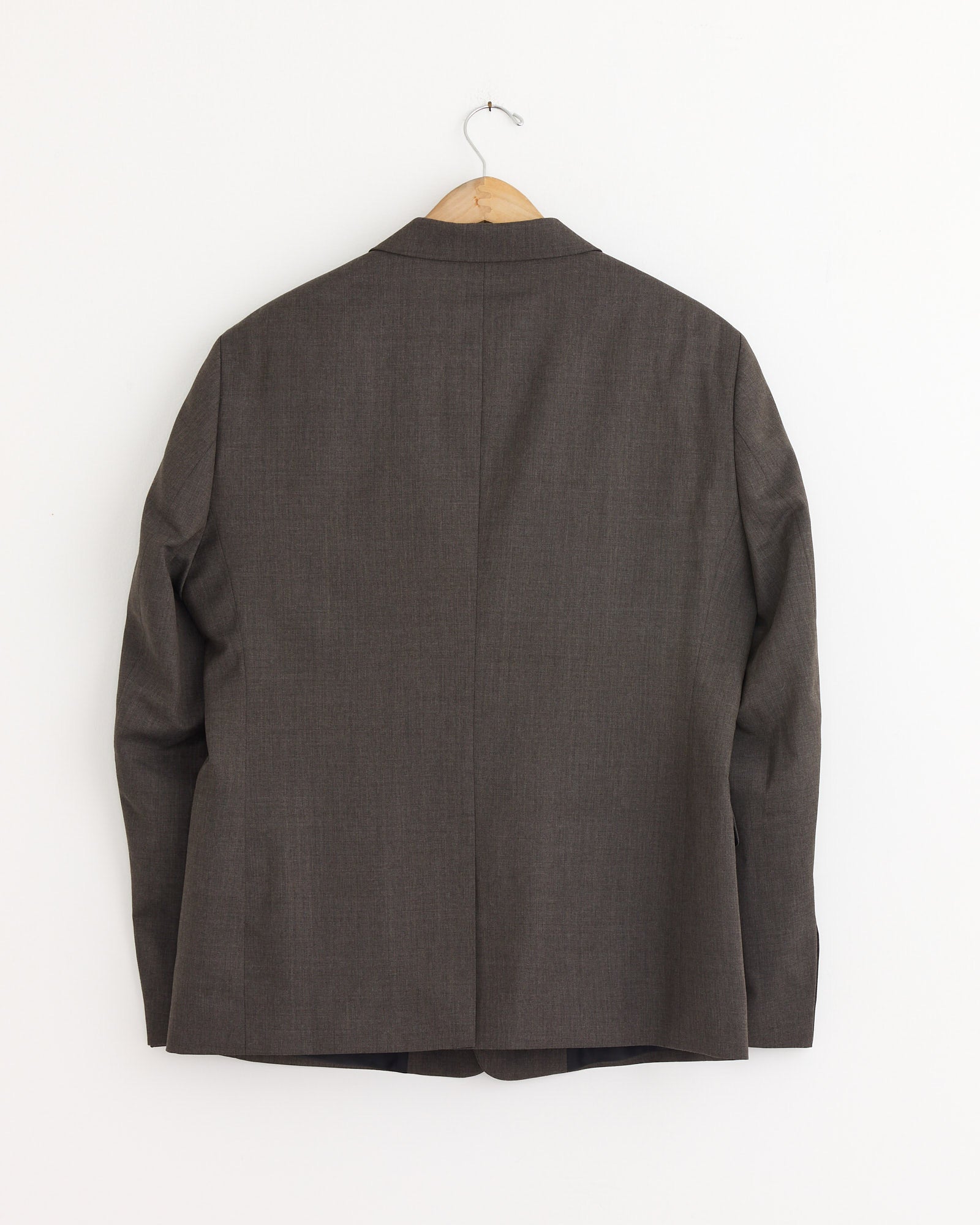 The mfpen Single Breasted Blazer in Taupe exudes classic elegance, perfect for pairing with any look.