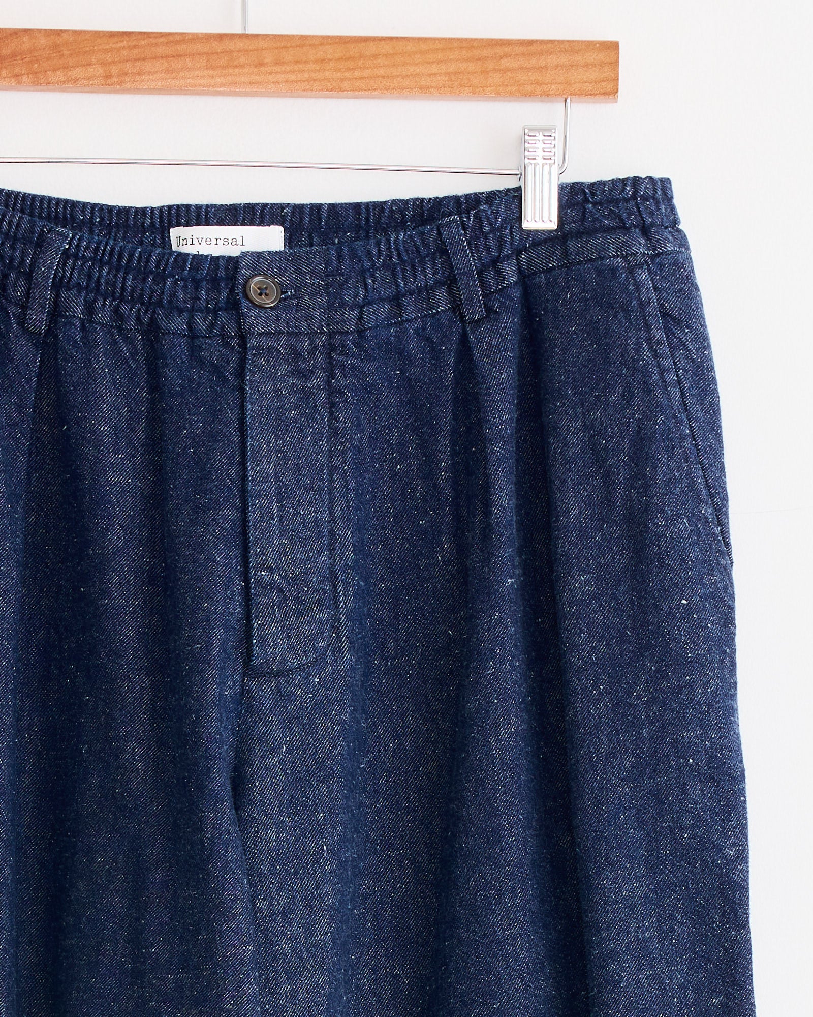 The Oxford Pant in Indigo by Universal Works features classic styling and a refined indigo shade.