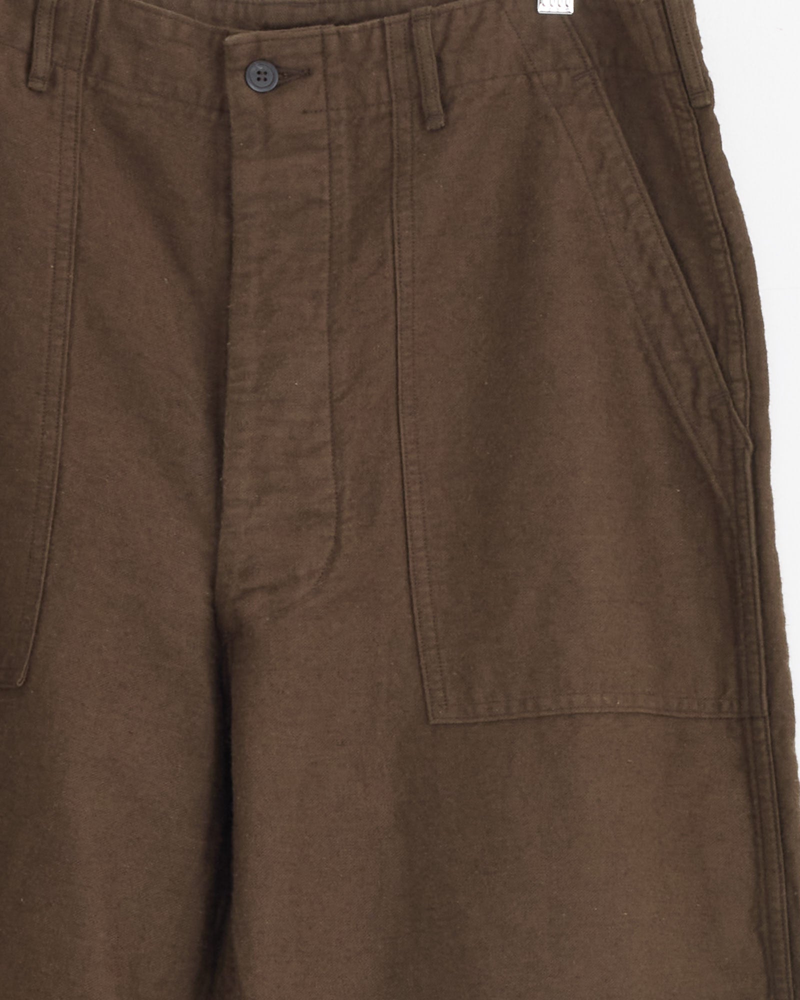 Close-up of the orSlow Relax Fit Fatigue Pant in Coffee Brown, crafted in cotton-linen moleskin with a button and zipper closure, belt loops, and large front patch pockets detailed with visible stitching.