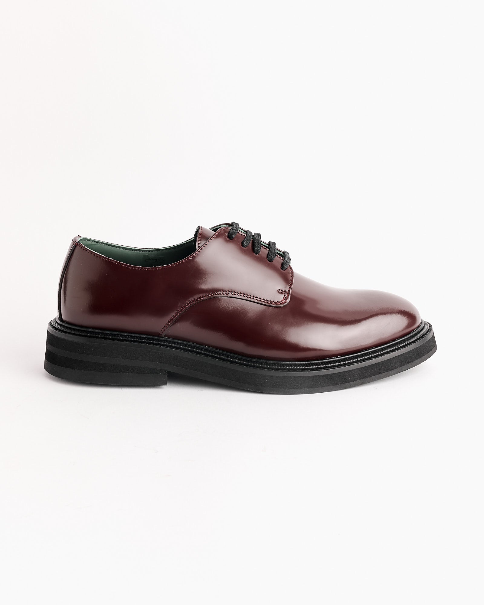 Vinny's Officer Derby in Burgundy, shown with black laces and a thick black sole, is photographed on a white background.