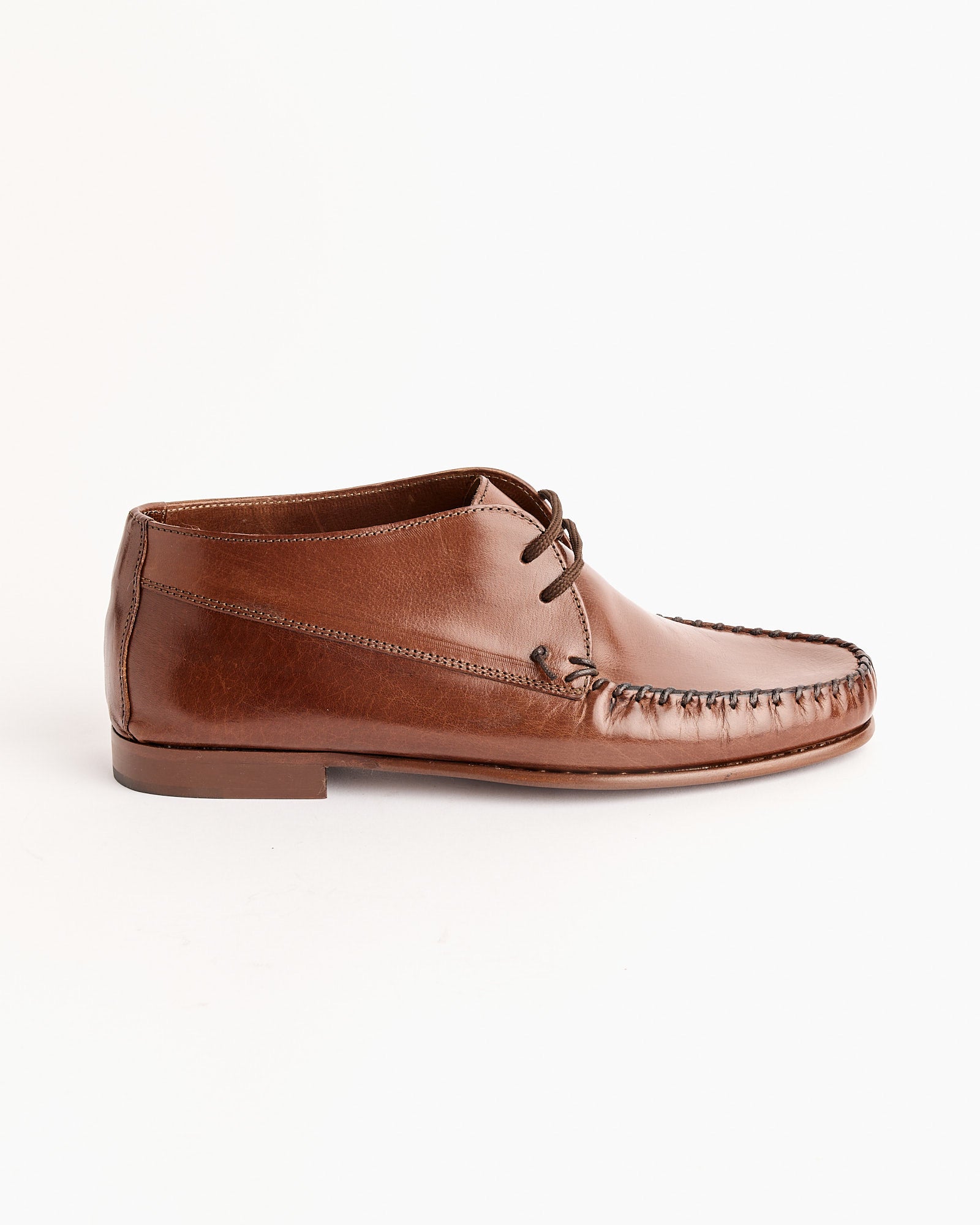 The Moc Bootie in Rich Brown by Jamie Haller is a handmade lace-up shoe in premium Italian buffalo leather, with visible side and toe stitching, photographed on a plain white background.