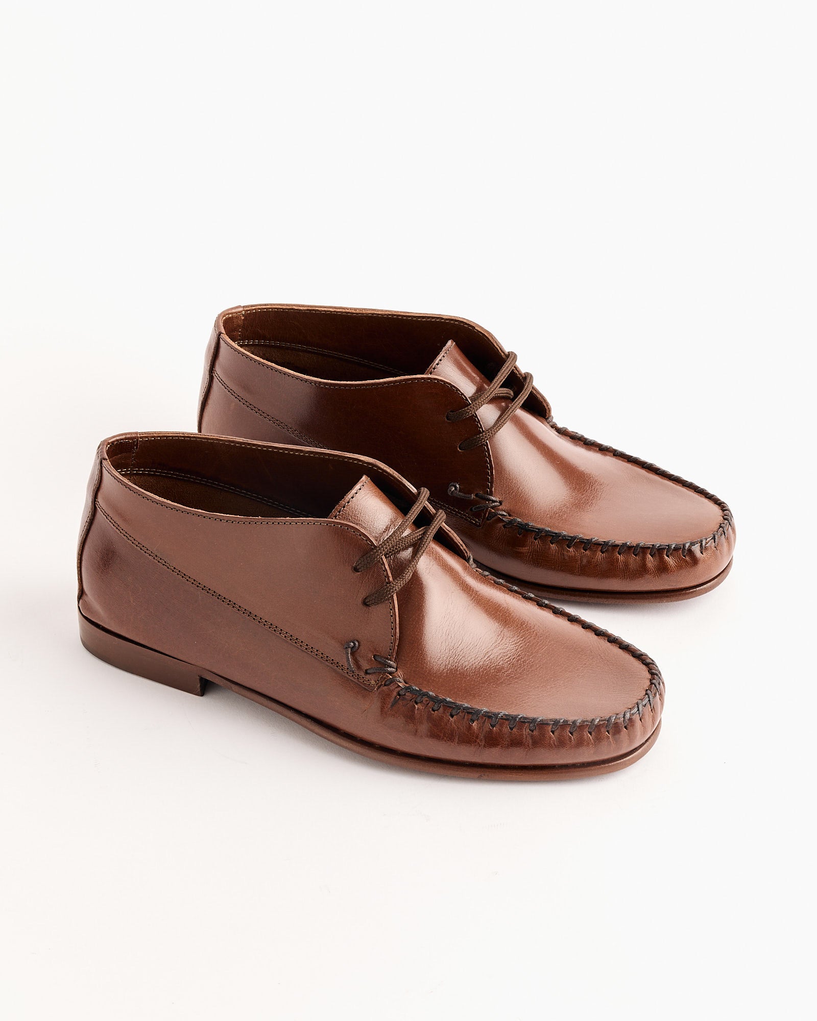 The Moc Bootie in Rich Brown by Jamie Haller: handmade in Tuscany from premium Italian buffalo leather, with laces and visible toe stitching. Shoes displayed on a plain white background.