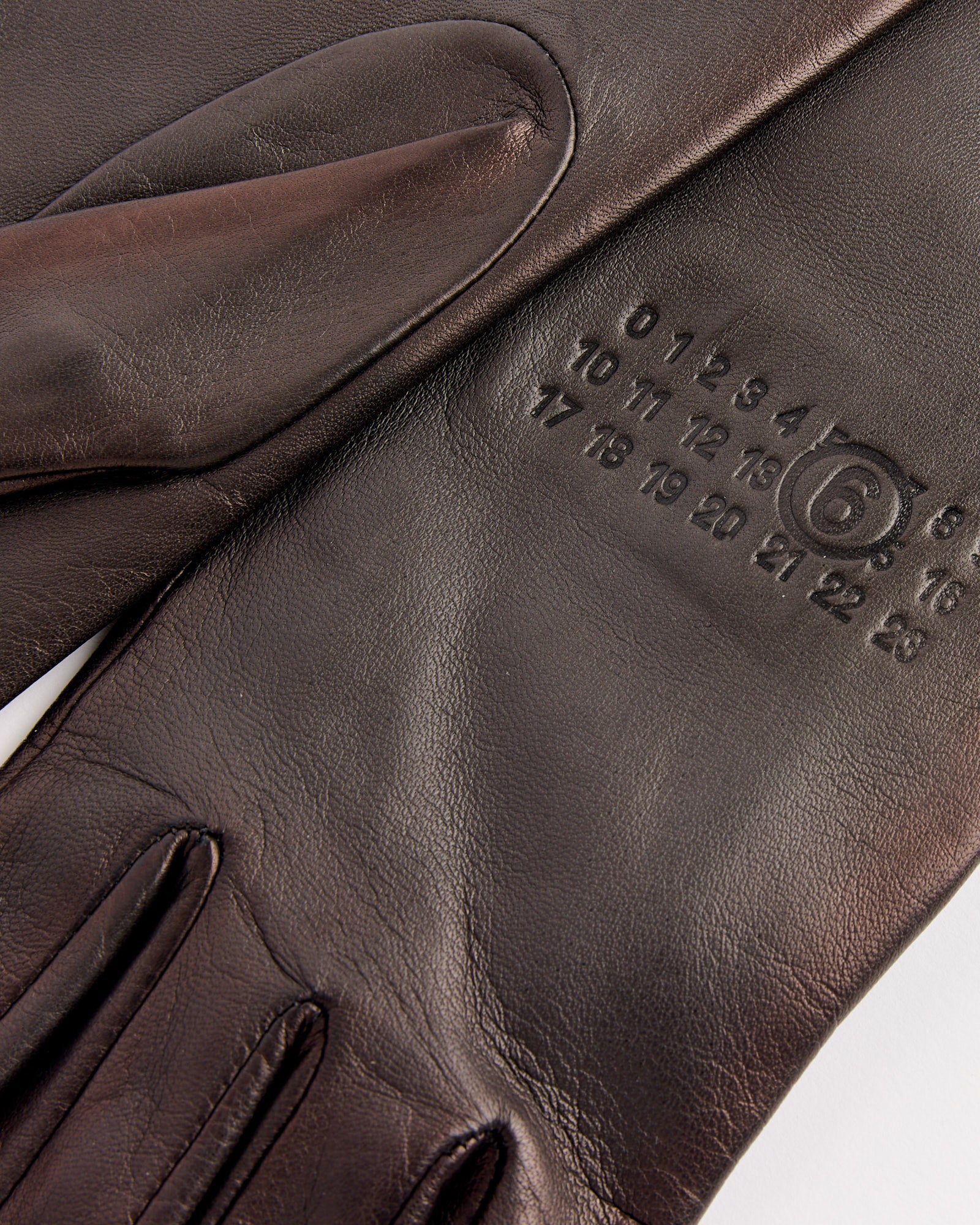 A pair of black Gloves by MM6 Maison Margiela designed for a perfect fit. For sizing questions, our online chat is here to help.