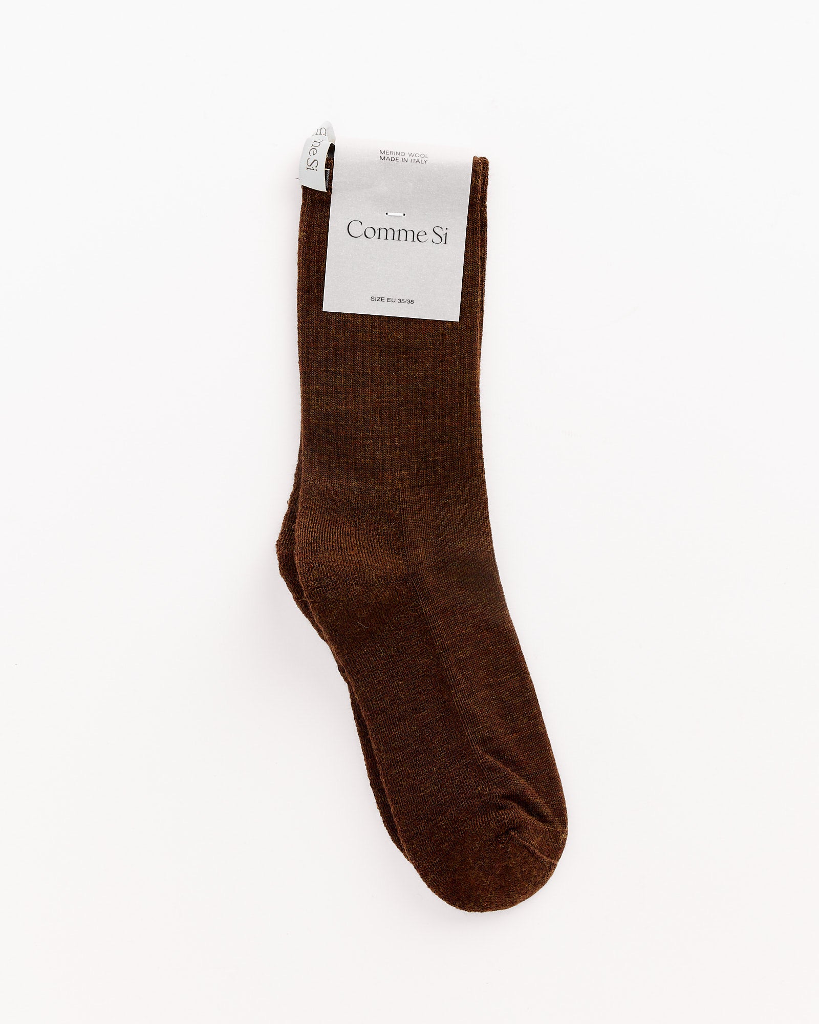 The Tube Sock in Cocoa by Comme Si, shown solo on a white background with a gray brand label. For sizing or fit questions, contact us via online chat.