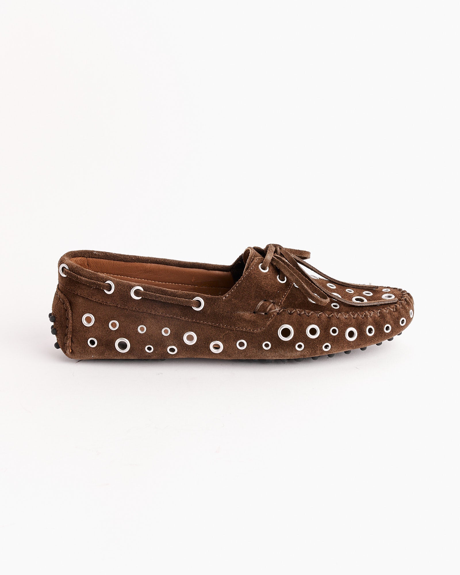 The Gimaguas Car Eyelets Shoes in Brown are Italian-made suede loafers featuring leather bow laces and white circular eyelet accents, shown in side profile on a plain white background.