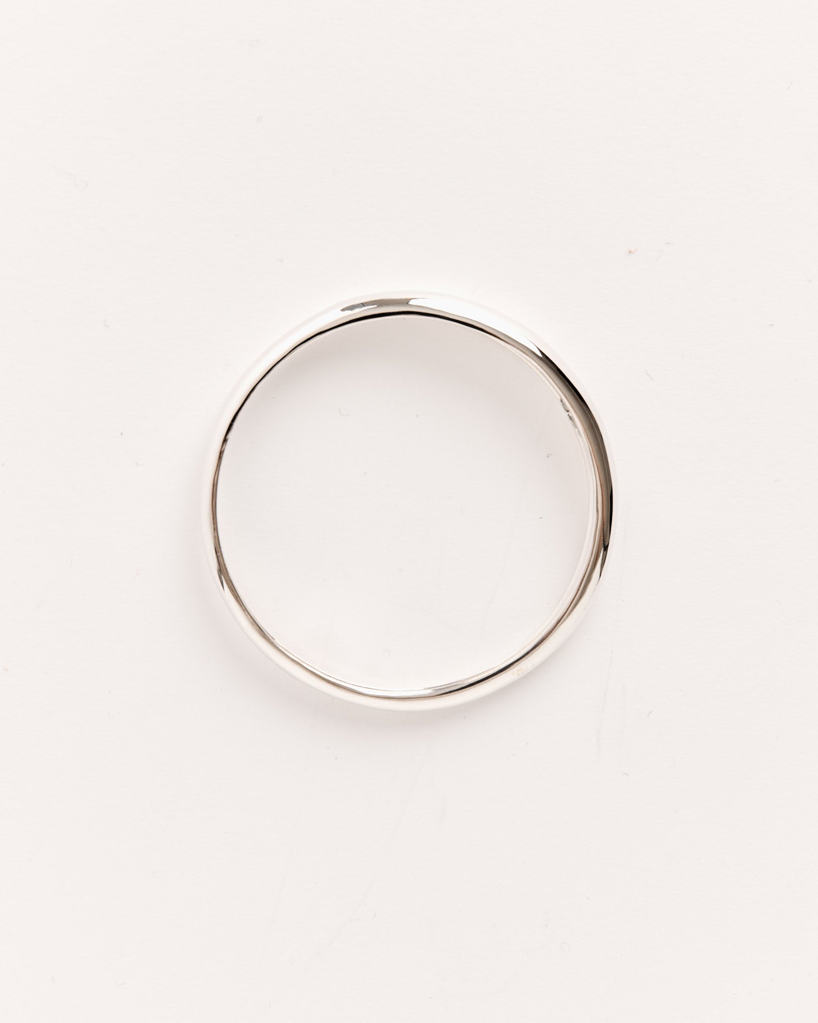 The Delicate Amorphous Bangle in Sterling Silver by Sophie Buhai is photographed on a white background, showcasing the refined, handcrafted elegance synonymous with Los Angeles jewelry design.