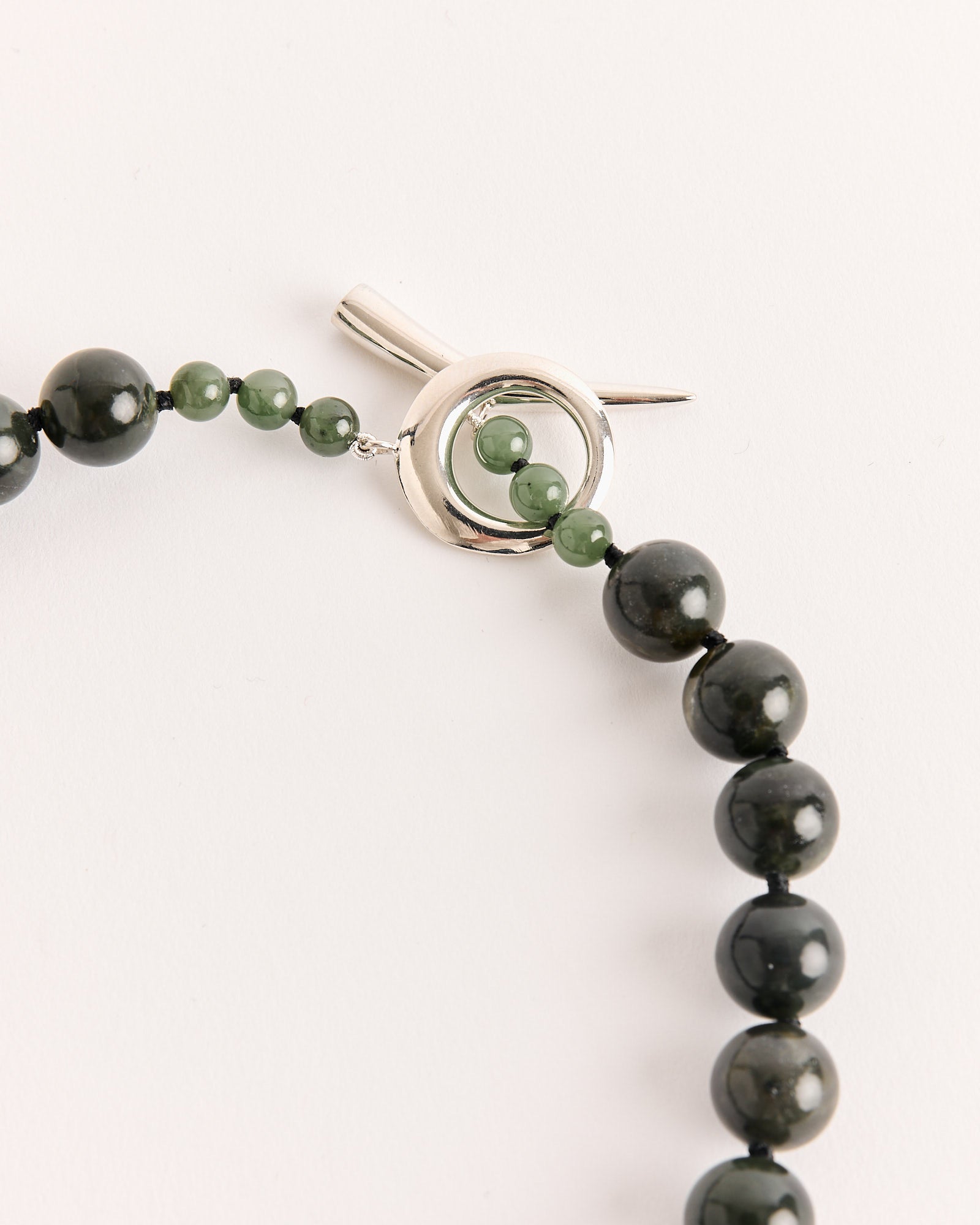 The Everyday Boule Collar in Jade by Sophie Buhai features elegant beads and a silver clasp, offered in various sizes. For the perfect fit, chat with us online.