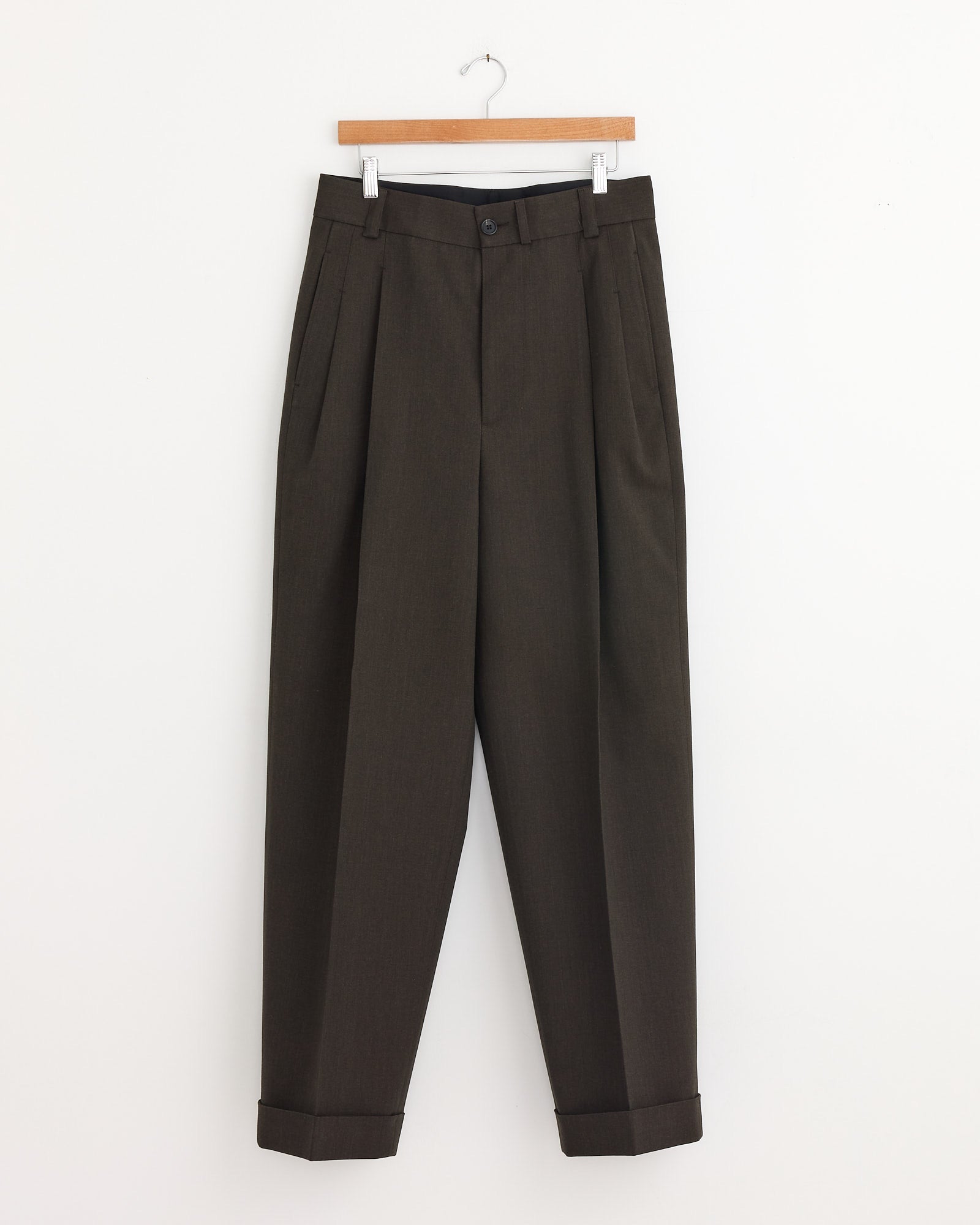 The Stitch Pleat Trouser in Khaki Brown by Margaret Howell features classic style and Italian craftsmanship.