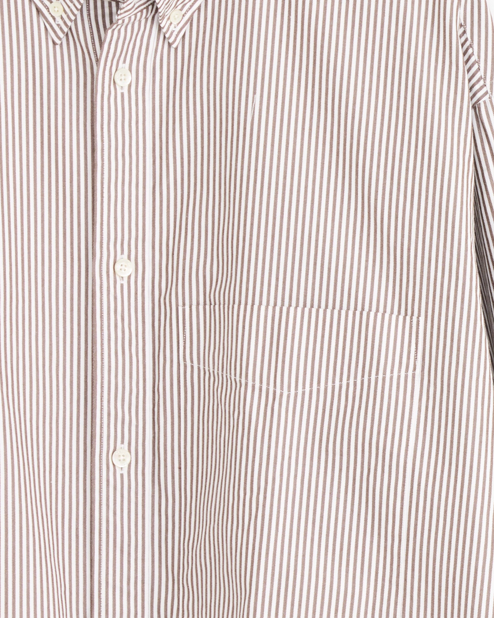 Close-up of the Studio Nicholson x BEAMS PLUS Lisa Shirt in Brown/White Stripe, featuring a chest pocket and cream buttons. Expertly crafted in Japan.