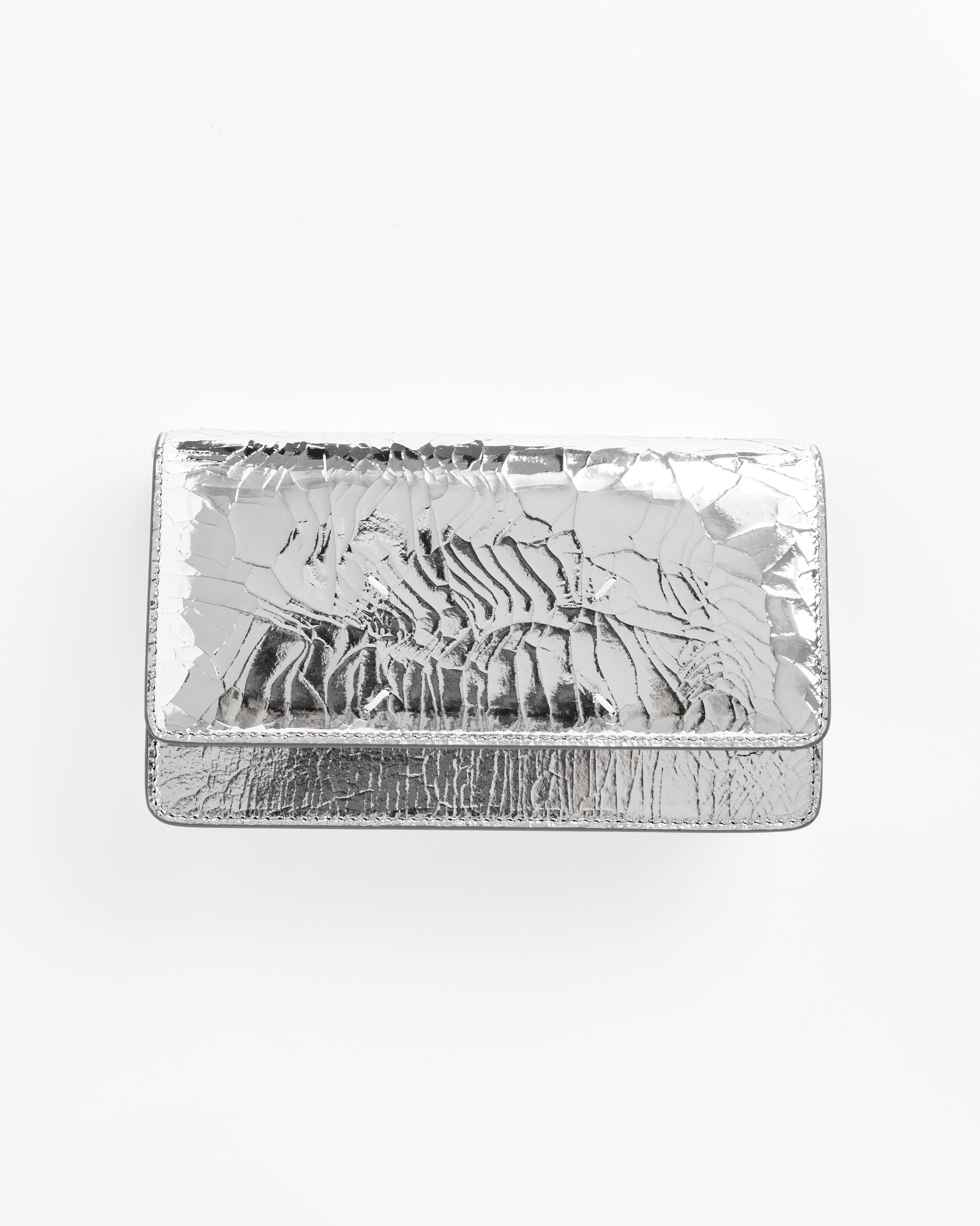 The Maison Margiela Broken Mirror Chain Wallet is a small, rectangular wallet with a cracked, textured metallic surface, shown against a plain white background.