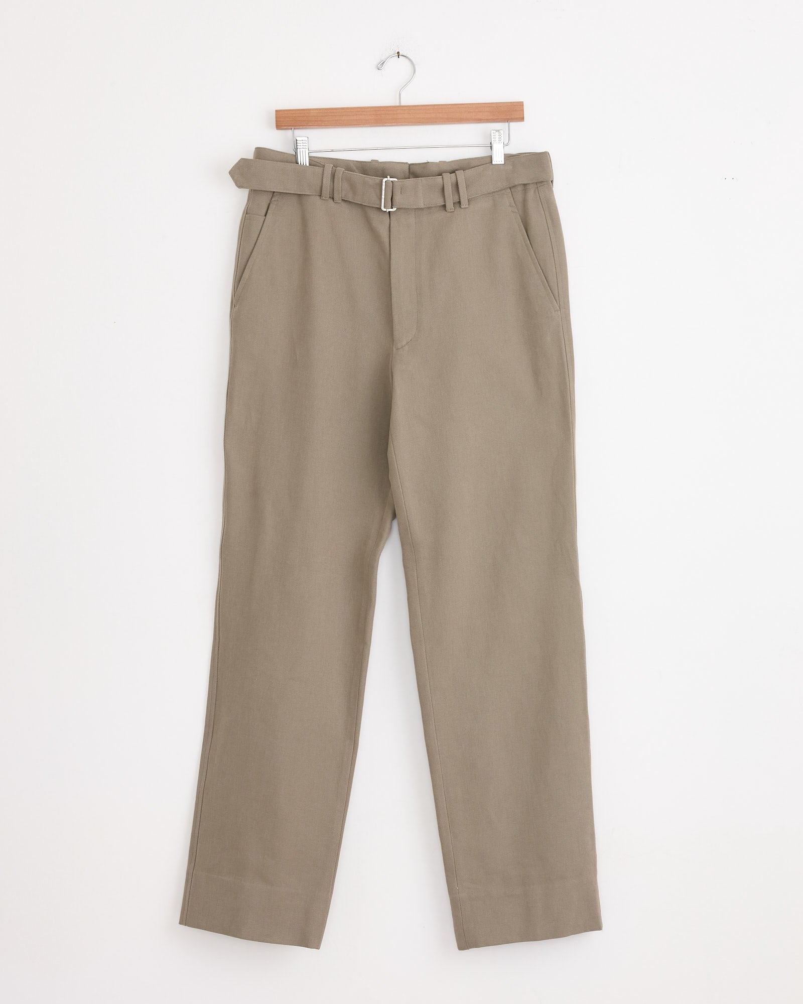Stoffa Plain Front Washable Trouser in Taupe, high-waisted with side pockets and matching belt, crafted in Italy from basketweave cotton, displayed on a wooden hanger against a white background.