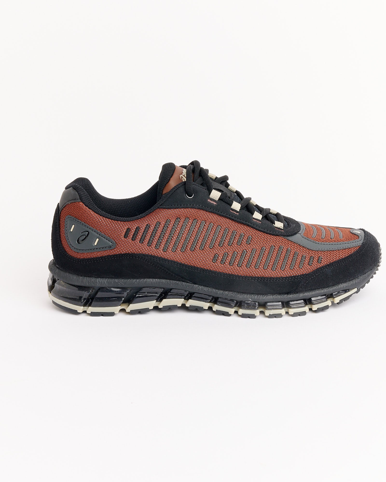 The Asics Gel-Quantum 360 I AMP in Reddish Brown/Black features a mesh upper, black laces, and cushioned sole for comfort, shown on a white background. Ideal for active lifestyles—contact our online chat to find your perfect size.