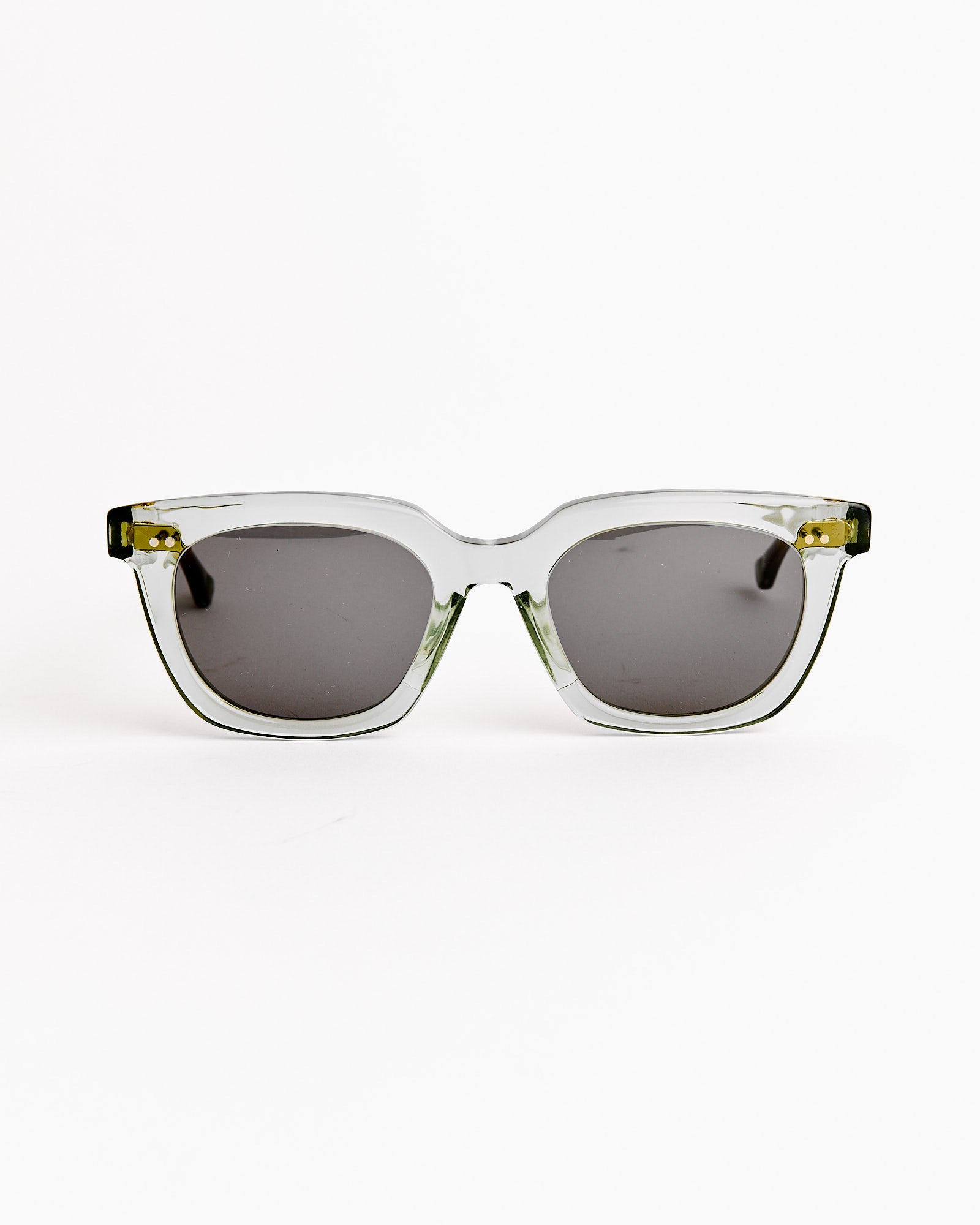 Native Sons Salinger 2 Sunglasses in Bottle Green/Sun Gold/GR-56 Grey feature stylish frames and rounded lenses, displayed upright against a plain white background.
