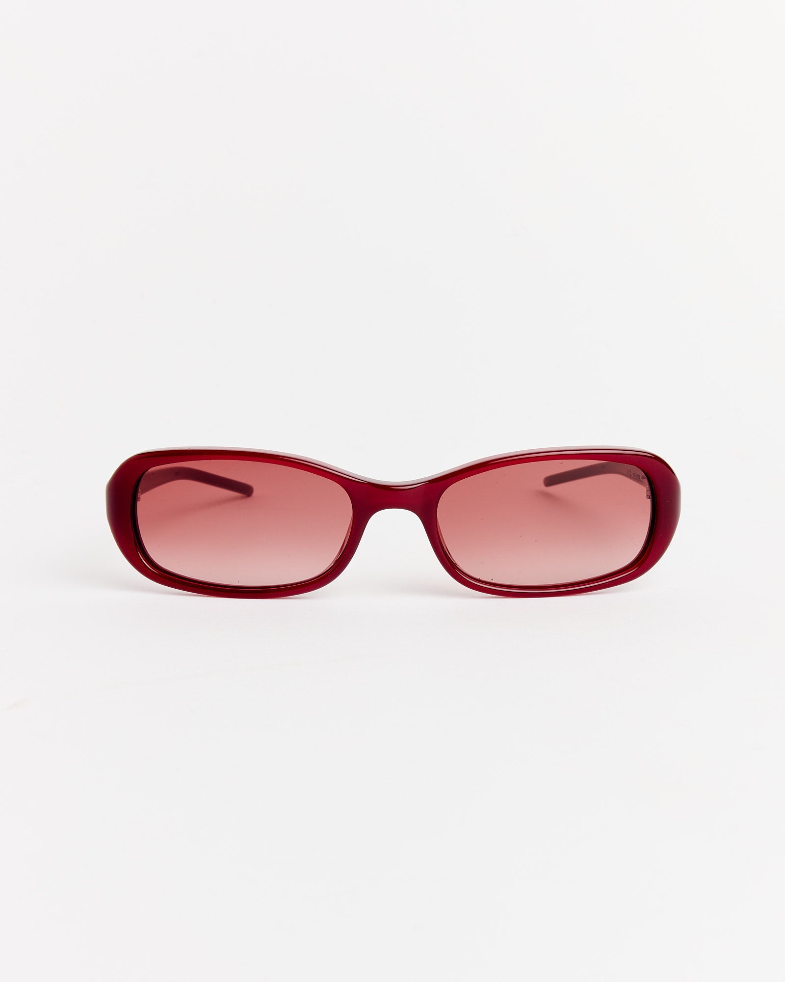 The Chimi Code Sunglasses in Dark Red feature rectangular, slightly rounded frames with matching red-tinted lenses, displayed on a plain white background. Use our online chat for help with sizing and fit.