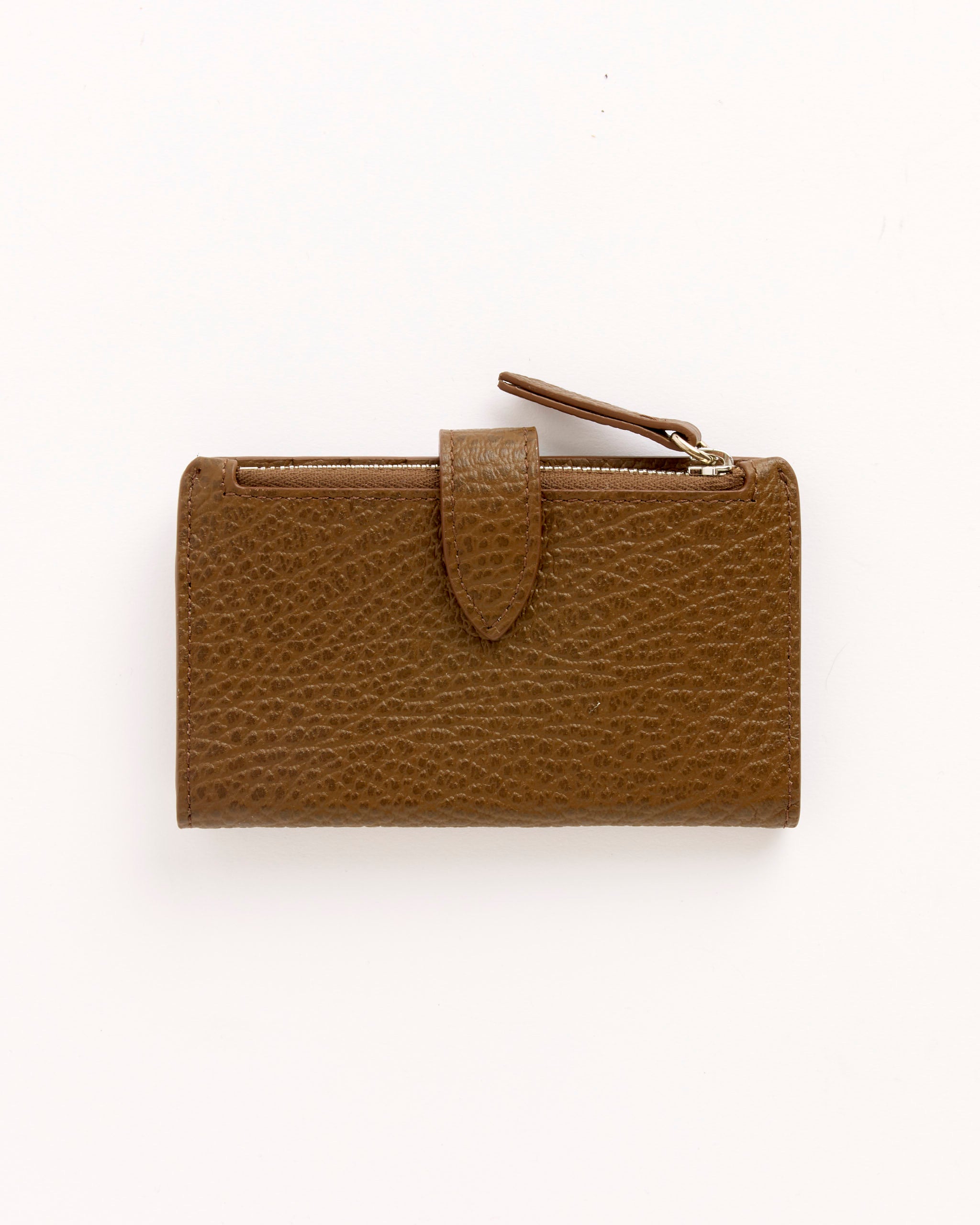 Maison Margiela Card Holder Clip 2 With Zip Wallet in Field: a brown leather wallet with a textured surface, top zip closure, and central snap tab, shown on a plain white background.