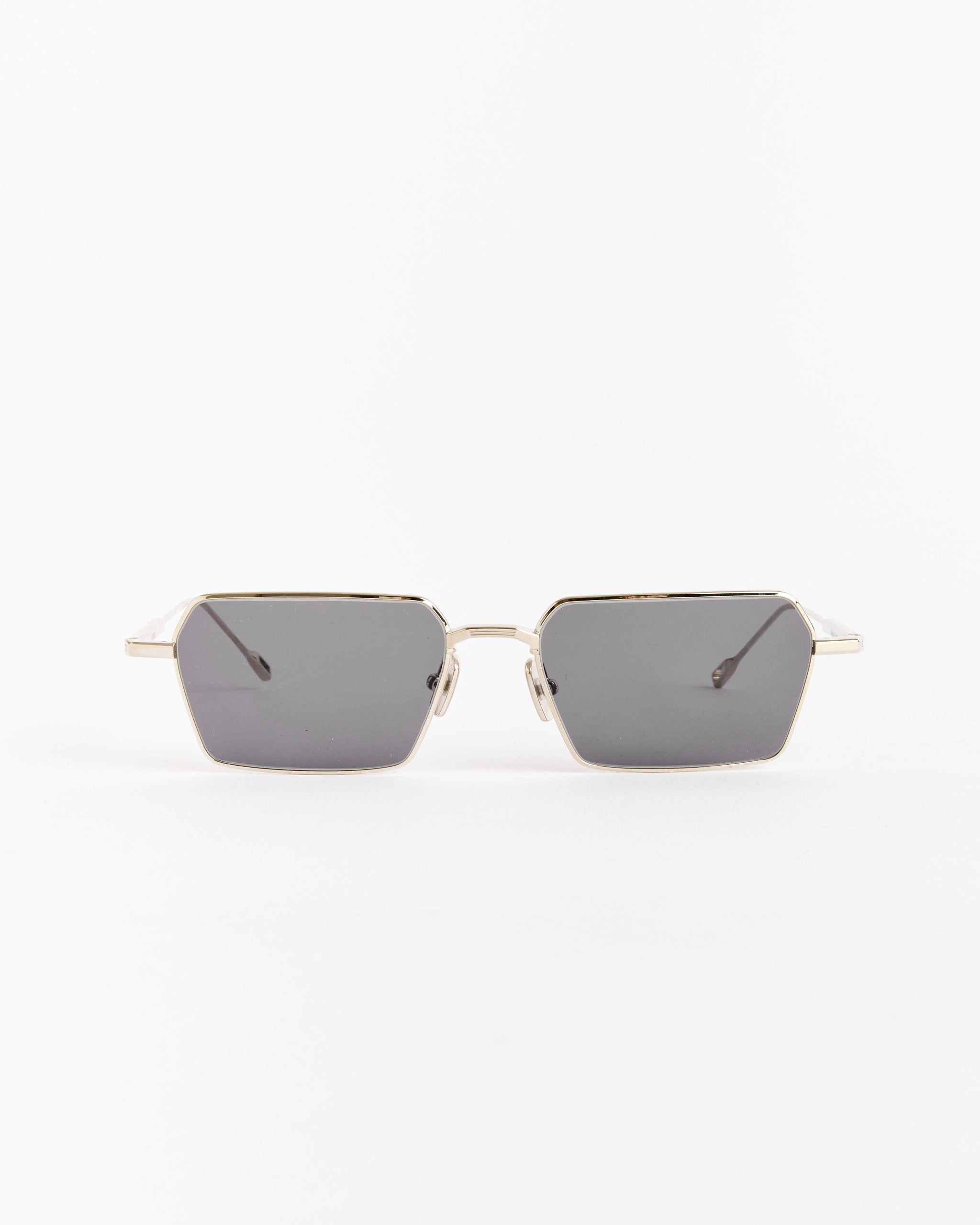 Native Sons Gibson Sunglasses in Silver with GR-19 Grey AR coated lenses, featuring a rectangular shape and thin metal frames, photographed on a plain white background.