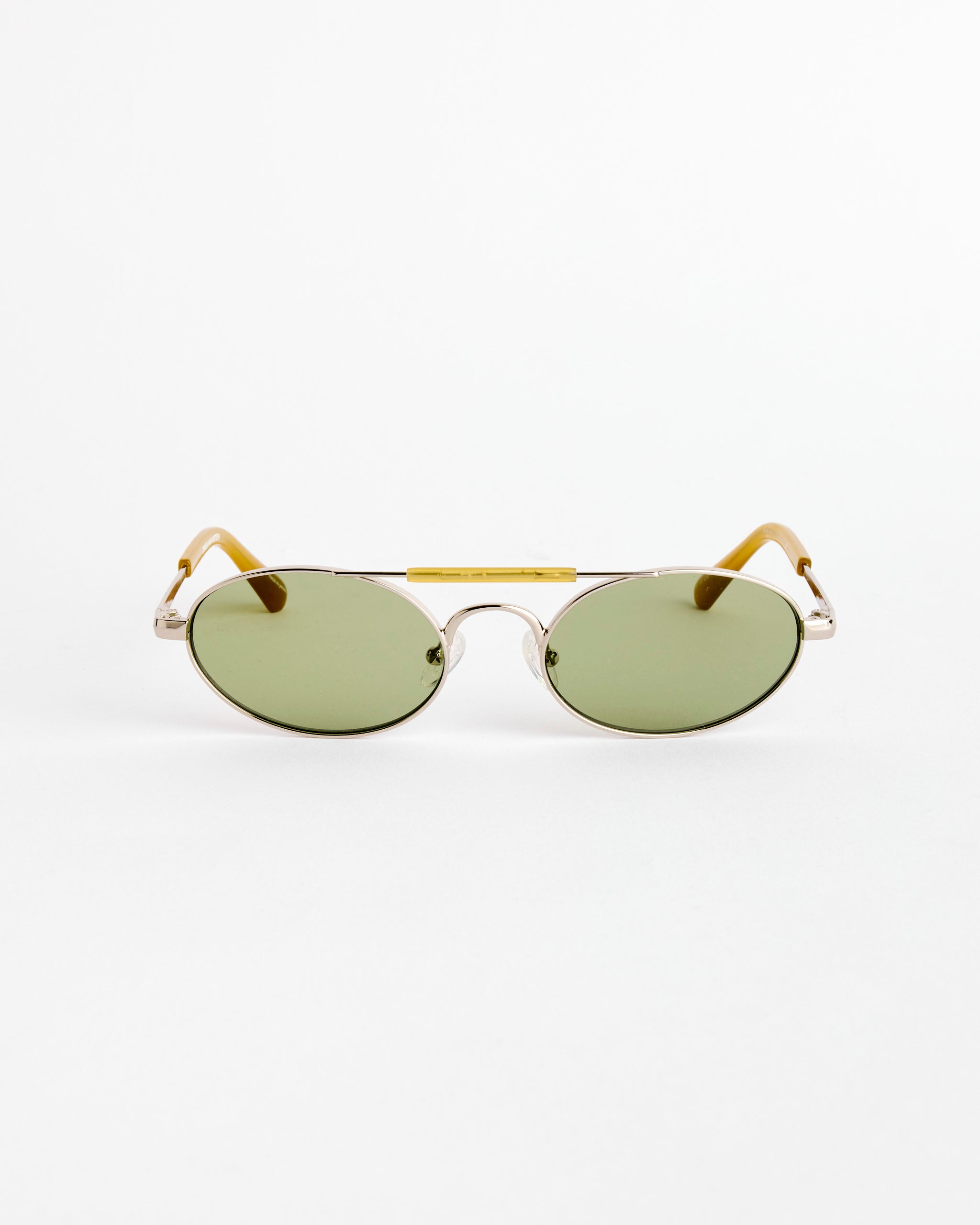 Dries Van Noten’s Sunglasses in Silver/Ocra/Green C2 feature oval green-tinted lenses, thin silver metal frames, and yellow temples, shown against a plain white background.