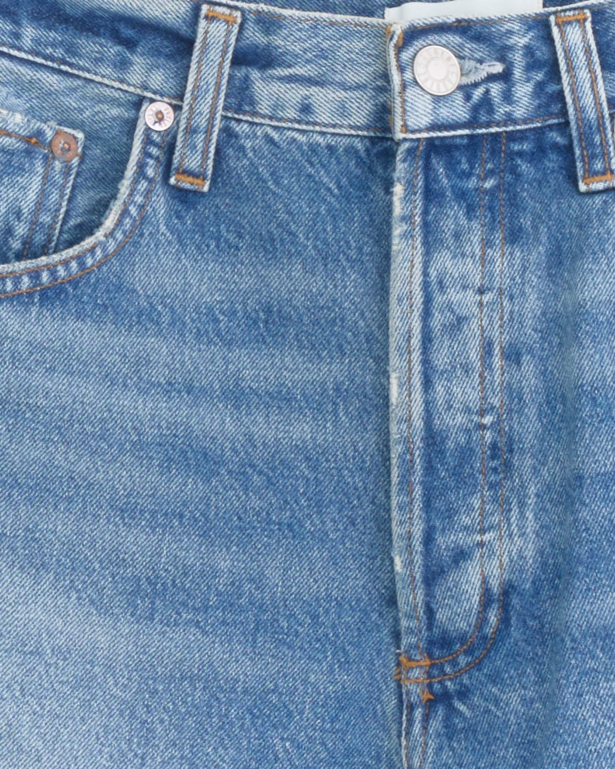 Close-up of the waistband and upper section of the AGOLDE Indra Short in Journal, featuring a metal button, belt loops, pocket stitching, and faded texture in regenerative cotton denim.