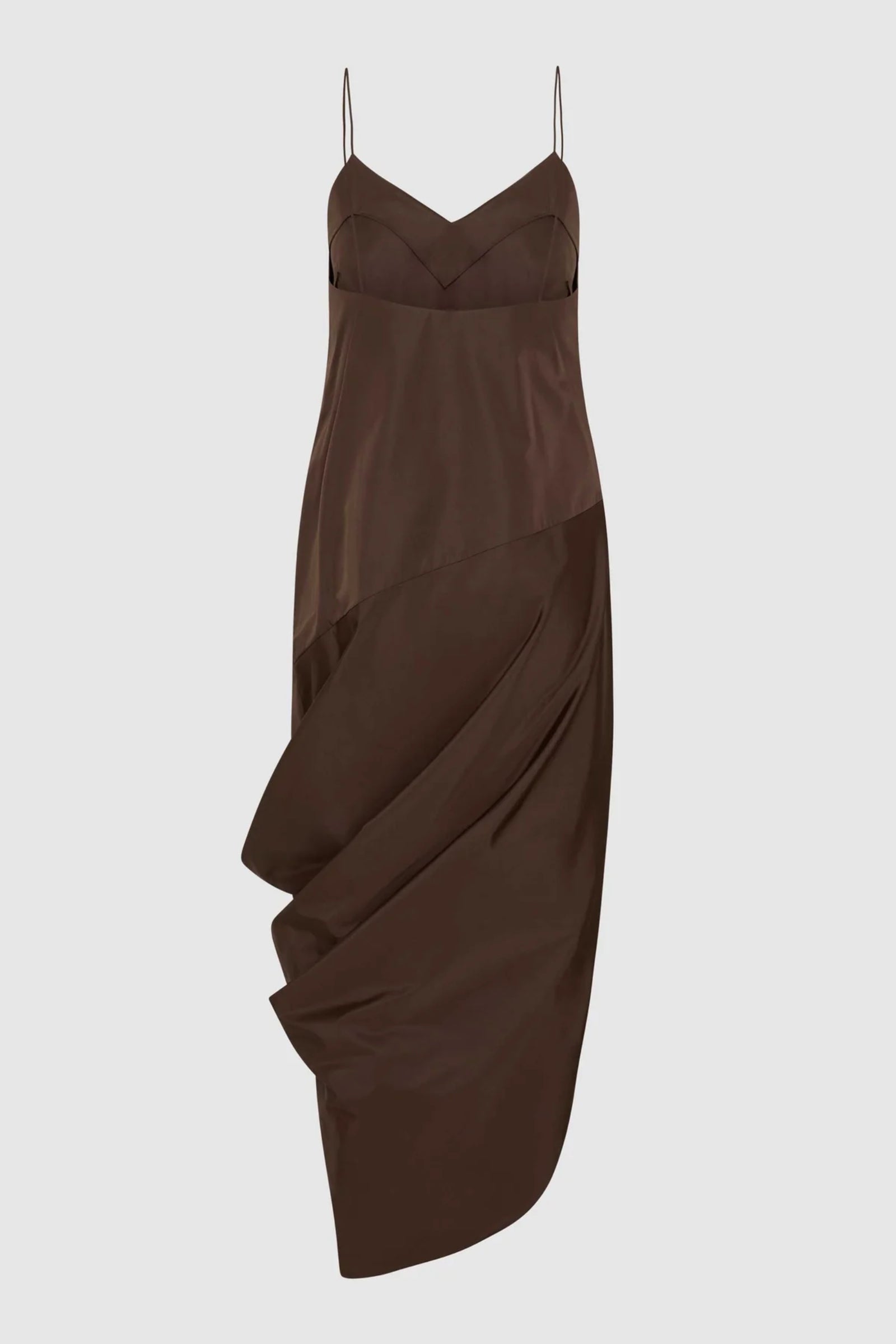 The ST. AGNI Paper Taffeta Drape Dress in Mocha is a sleeveless slip dress with thin straps, a sweetheart neckline, and an asymmetric draped skirt, displayed against a plain white background.