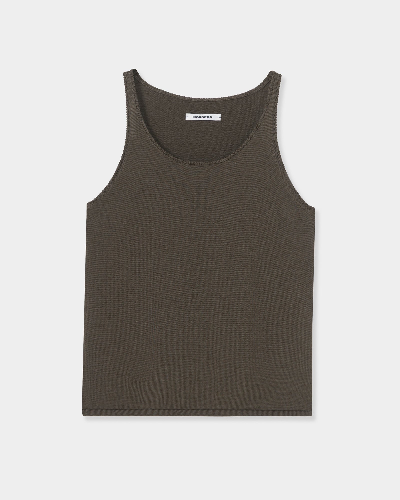 A sleeveless Merino Wool Tank Top in Taupe by CORDERA, featuring a round neckline, is laid flat on a white background.