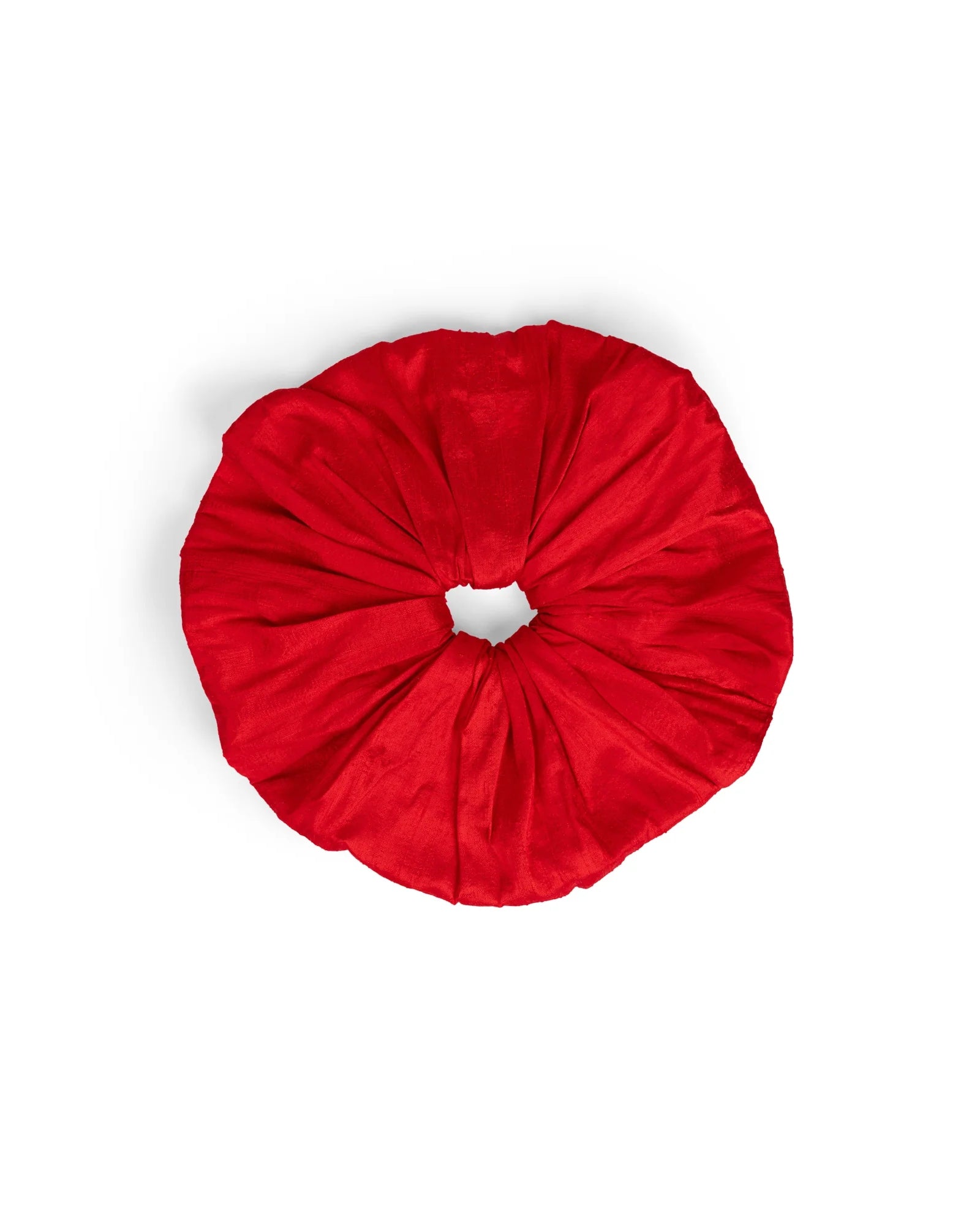 The Hai Silk Scrunchie, a large red hair accessory crafted from luxurious Dupion silk, is shown against a plain white background.