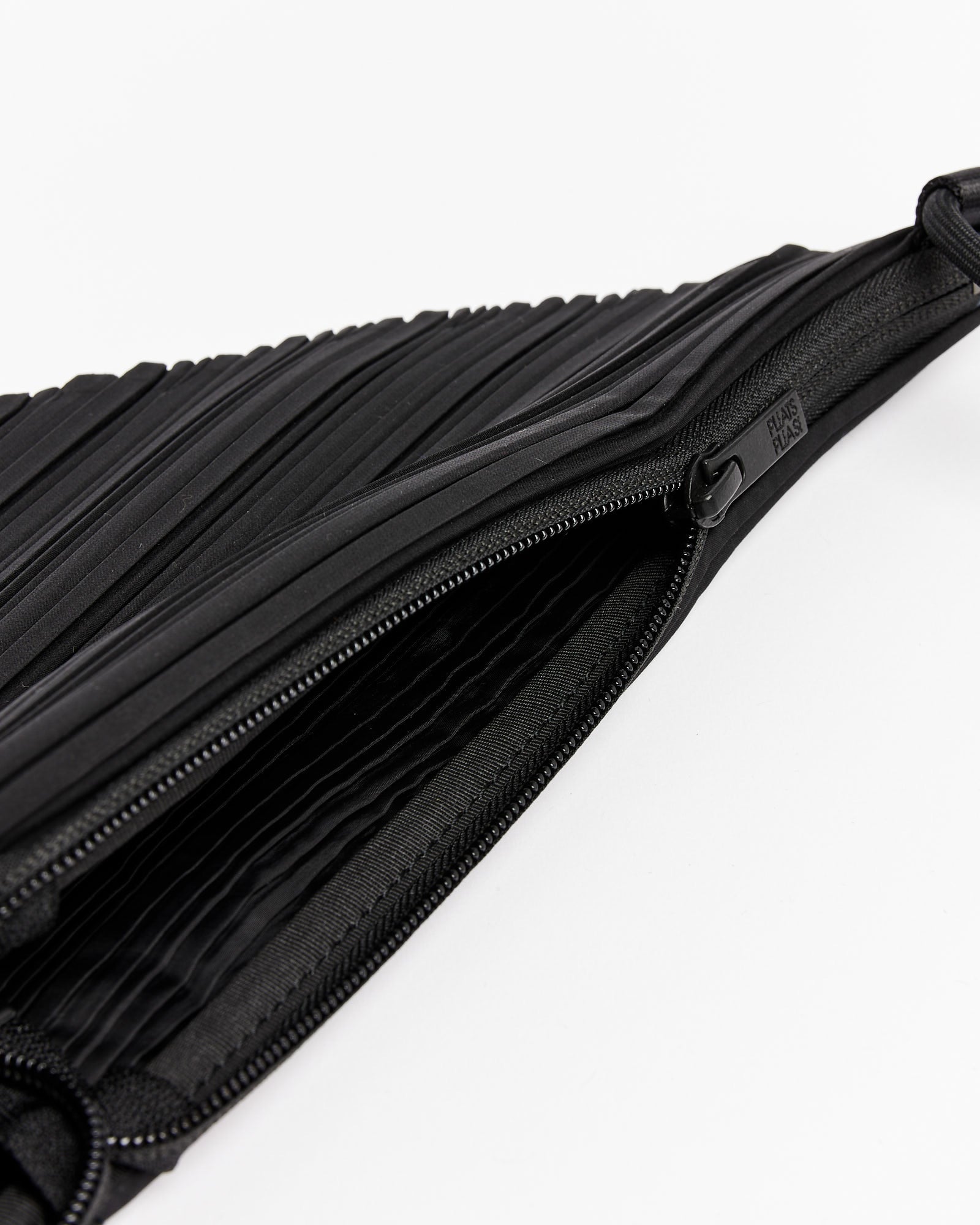 Black Leaf small technical-pleated cross-body bag, Pleats Please Issey  Miyake